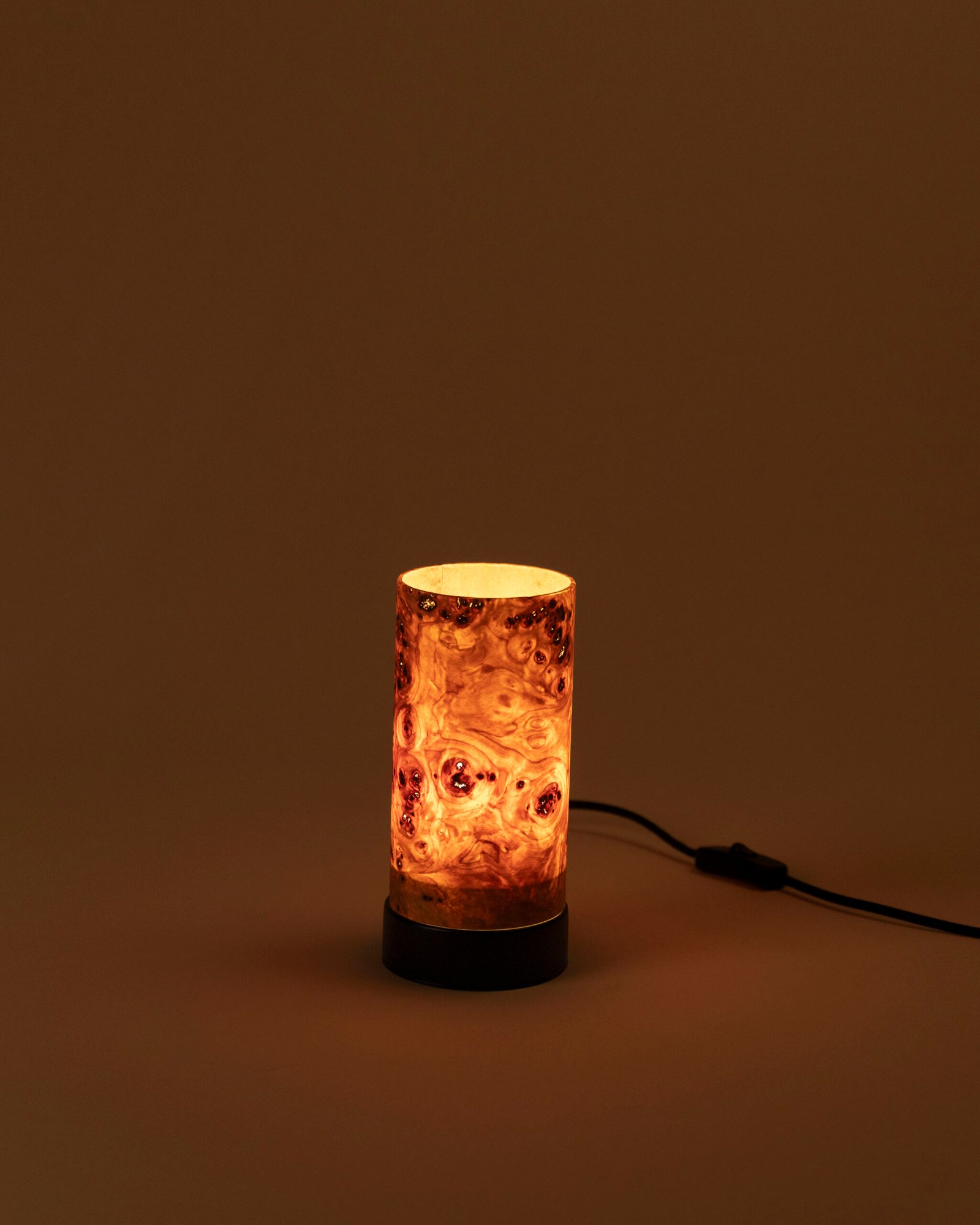 Close up of LIEKKI 20 cm mazel wood veneer table lamp handcrafted detail natural texture