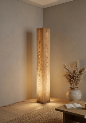 Handcrafted wooden floor lamp in a cozy living room with warm ambient lighting